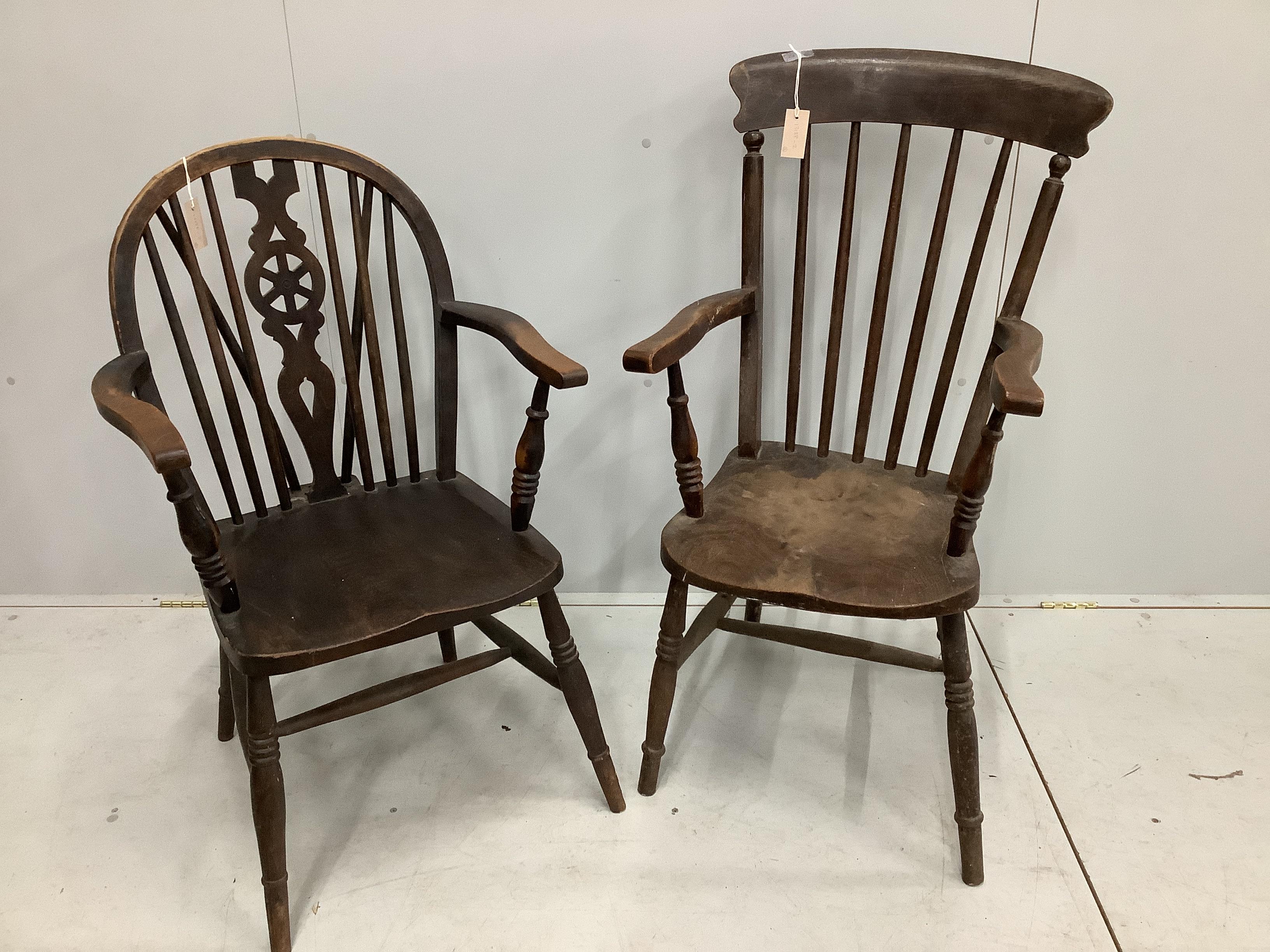 A Victorian elm and beech Windsor comb back armchair, height 107cm together with a later wheel back elbow chair